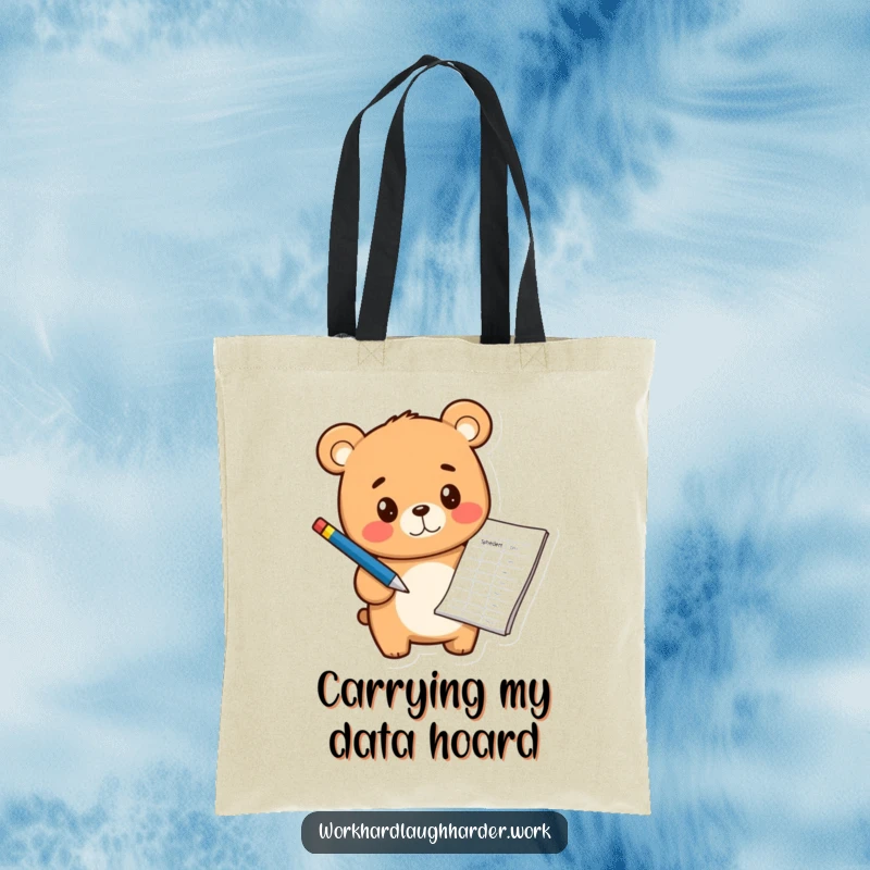 Funny cheerful bear cub holding a pen and pointing at a spreadsheet, showcased on a durable canvas tote bag.