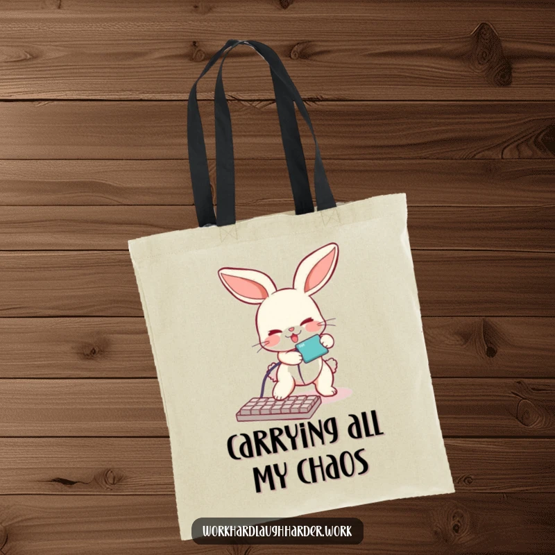 Funny tote bag with a bunny comically tripping over a keyboard cable, perfect for carrying items with tech humor.