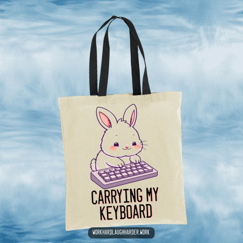 Funny fluffy rabbit typing enthusiastically on a keyboard, showcased on a durable canvas tote bag.